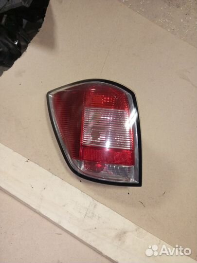 24451838 Opel фонарь левый астра н универсал