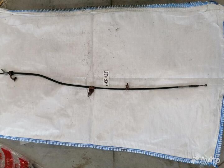 Трос стояночного тормоза левый Chery T11 2013-2016