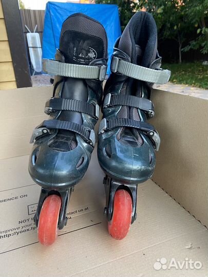 Роликовые коньки