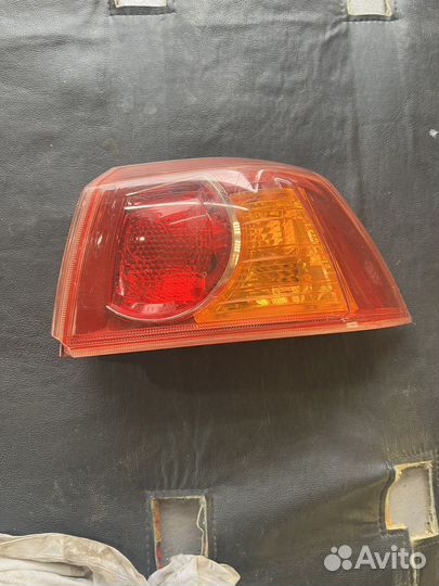 Фонарь задний правый Митсубиши Лансер 10