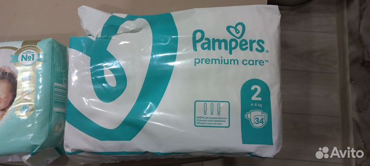 Подгузники 0 и 2 pampers premium care