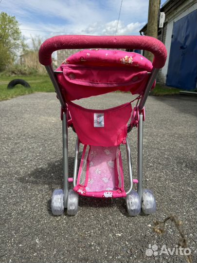 Игрушечная коляска для кукол