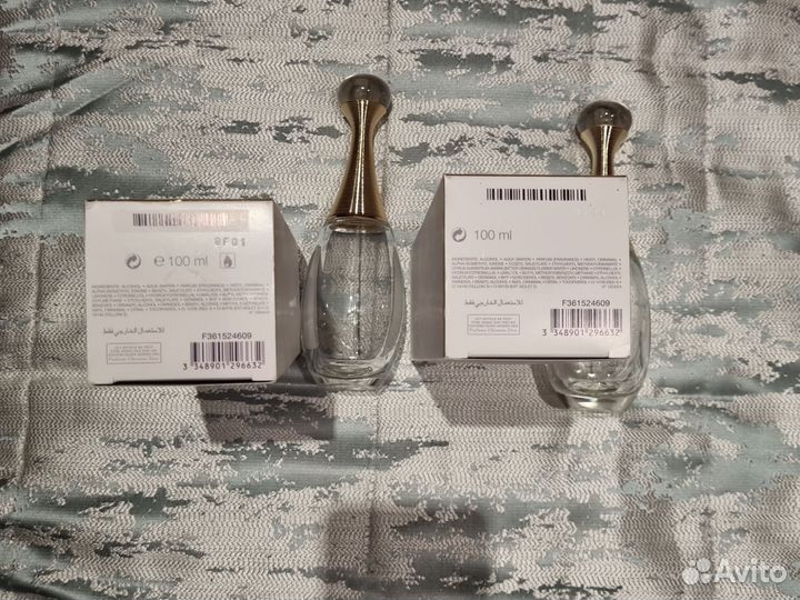 Пустые флаконы от парфюма Dior Jadore