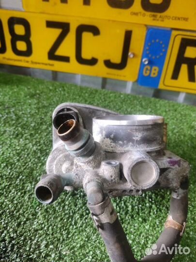 Дроссельная заслонка Opel Zafira B Z18XER 2009