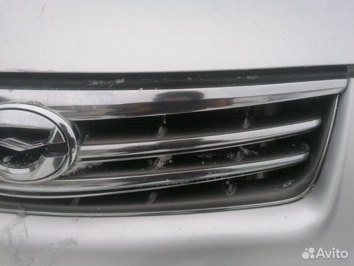 Решетка радиатора Toyota Corolla Axio NZE144