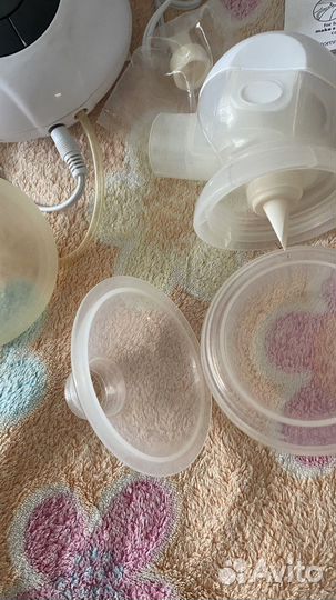 Электрический молокоотсос