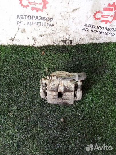 Суппорт тормозной передний правый Suzuki Escudo