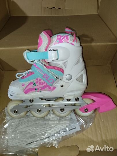 Роликовые коньки