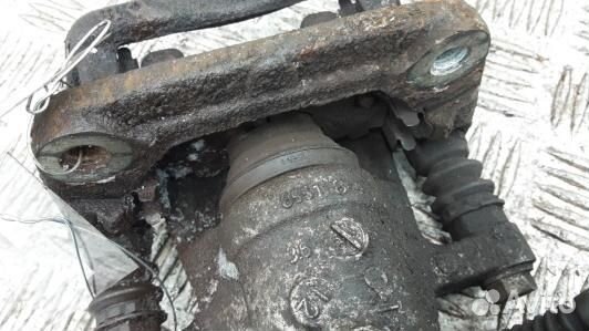 Суппорт тормозной задний левый KIA CEE'D 2 (JD) (4