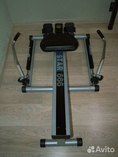 Гребной тренажер