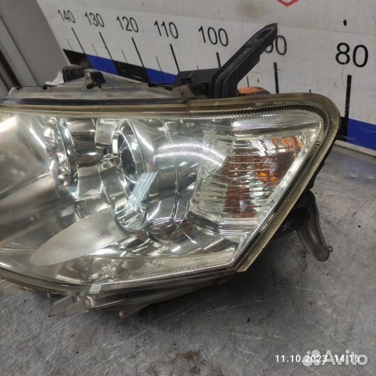 Фара передняя левая Mitsubishi Pajero Sport 2 4D56