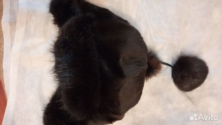 Женские меховые шапки