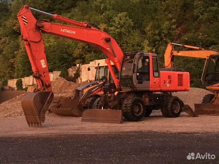 Услуги экскаватора погрузчика