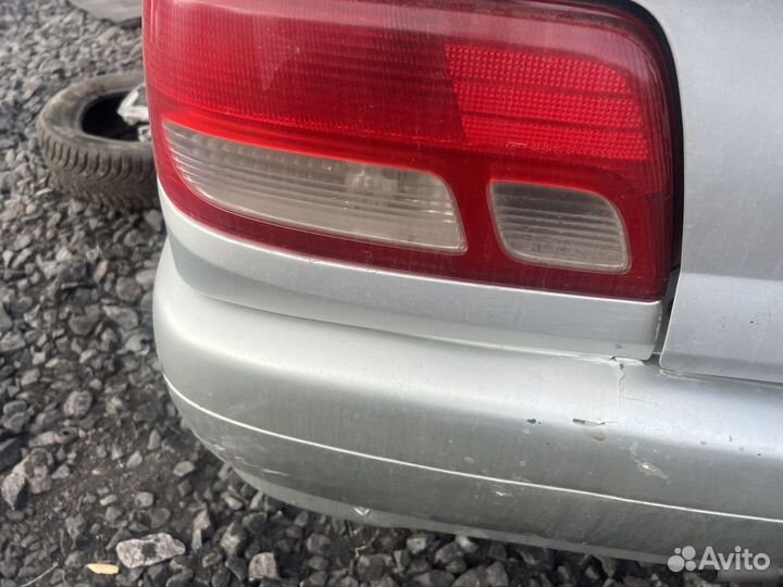 Задний фонарь Toyota Carina ST215 левый