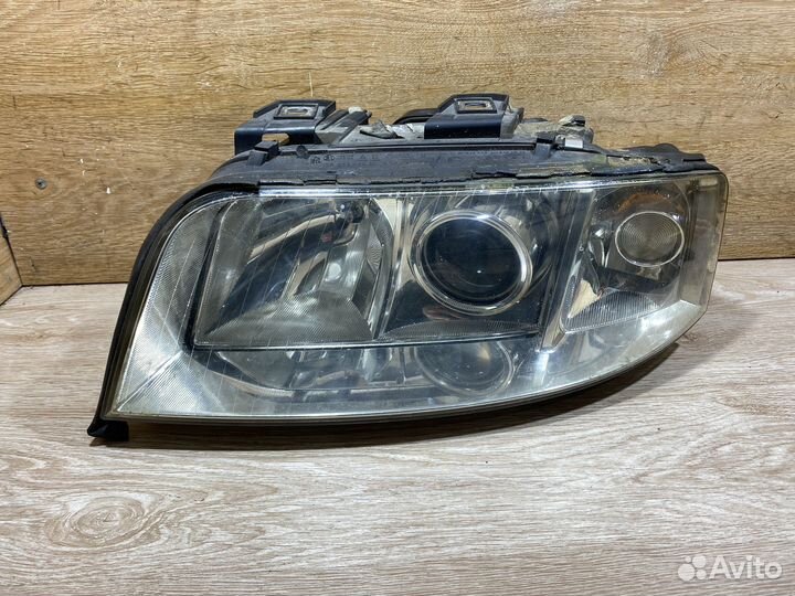 Фара левая Audi A6 C5 рестайлинг 142249