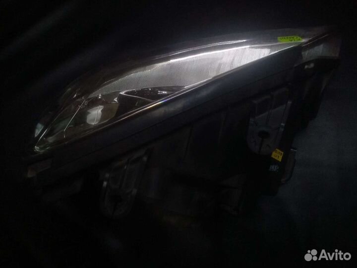 Фара левая Kia Carens 1