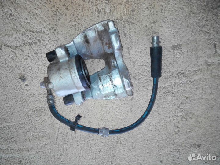 Суппорт передний левый astra H/zafira B