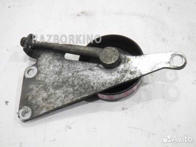 Ролик натяжителя ремня