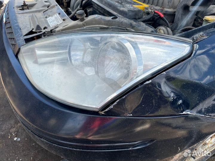 Фара левая Ford Focus 1 cdda 2004