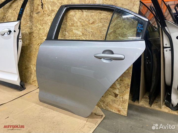 Тойота Королла Е210 левая дверь