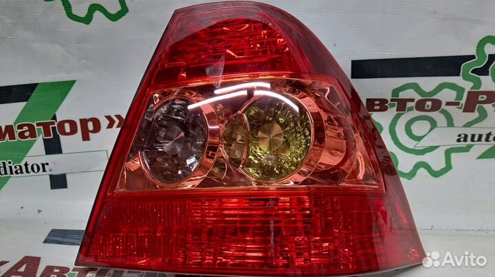 Фонарь задний toyota corolla 04-06 RH 4D европа
