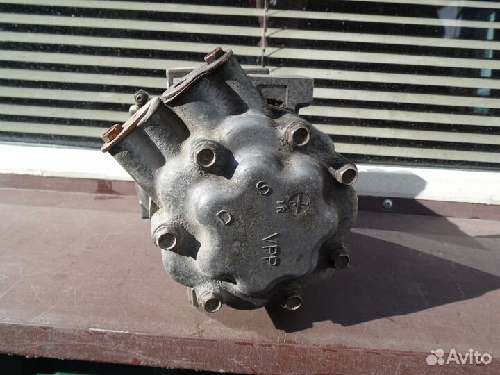 Компрессор кондиционера Рено Логан Сандеро