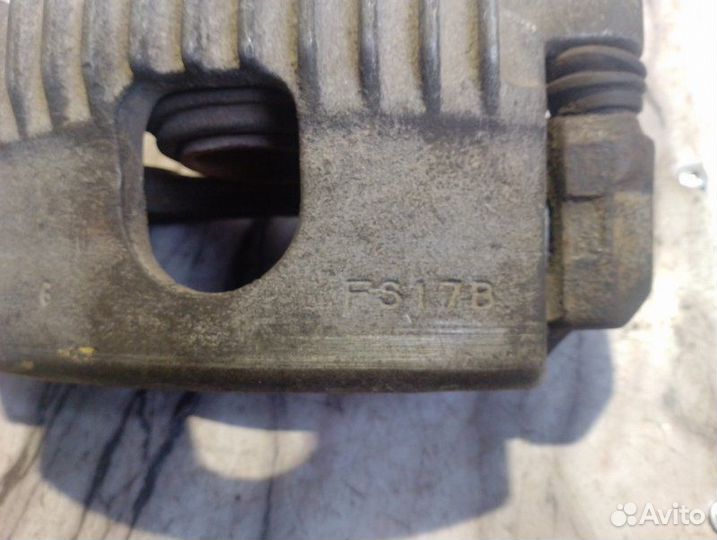 Суппорт тормозной передний правый Kia Sportage FE