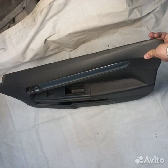 Обшивка двери передняя правая Opel Astra H