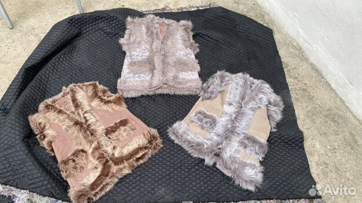 Женские натуральные безрукавки из овчины