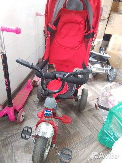 Трехколесный велосипед с ручкой