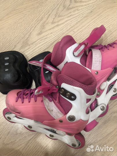 Роликовые коньки
