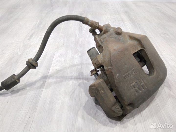 Суппорт тормозной передний правый Ford Focus CB