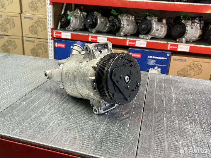 Компрессор кондиционера Opel Astra j