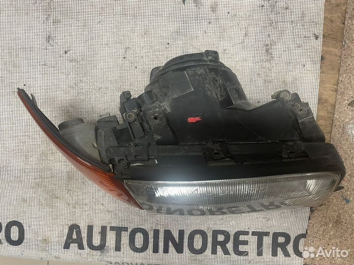 Фара правая Audi 100 C4 hella 4A0941030