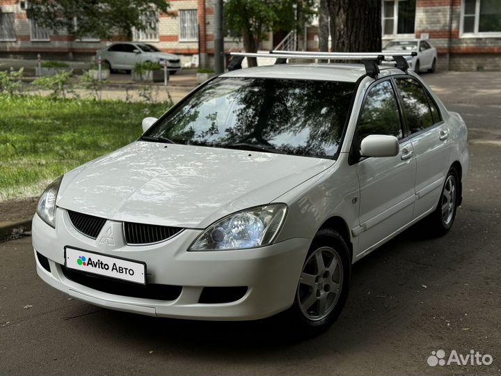 Mitsubishi Lancer 1.3 МТ, 2005, 233 385 км
