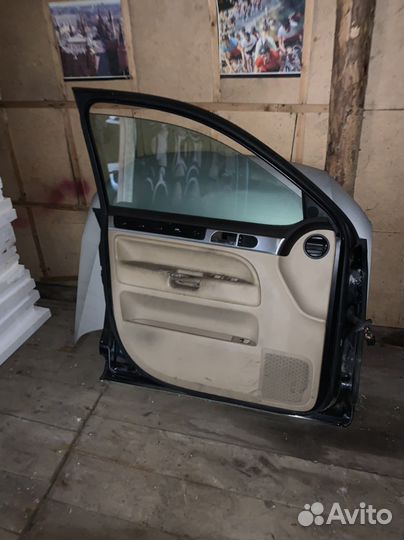Дверь передняя правая-левая туарег 2006