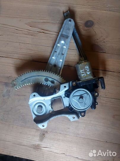 Стеклоподъемник задний правый nissan march k12