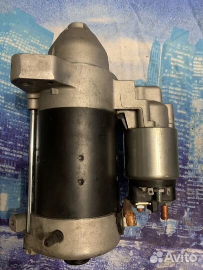 Стартер на audi q7 номер 057911023Е