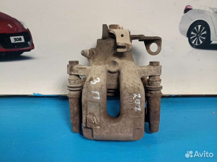 Суппорт задний правый Peugeot 207