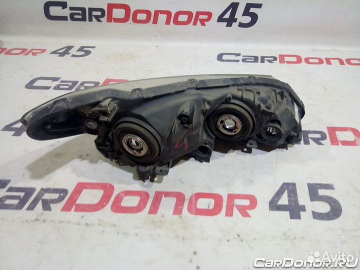 Фара головного света левая б/у для Honda Civic (33