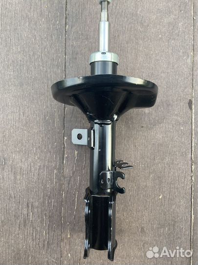 Амортизатор передний левый KIA Spectra (00-11)