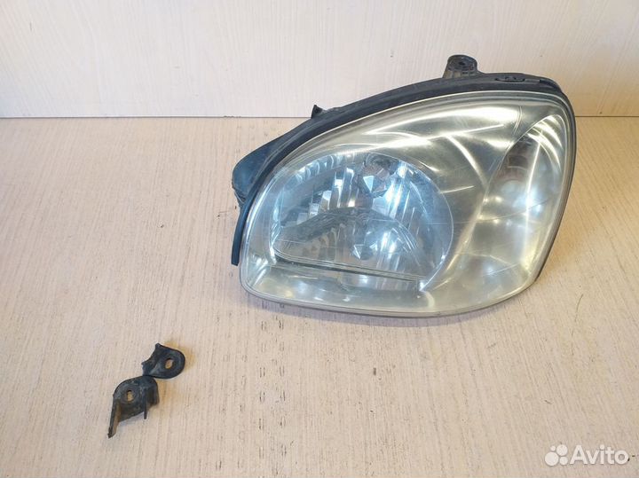 Фара левая Hyundai Santa Fe SM