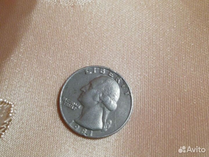 Монета liberti