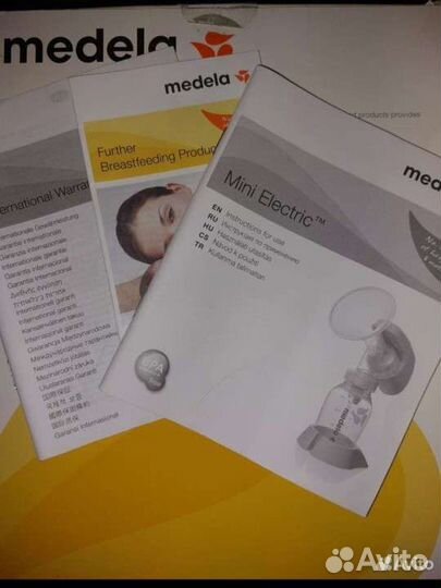 Молокоотсос medela электрический