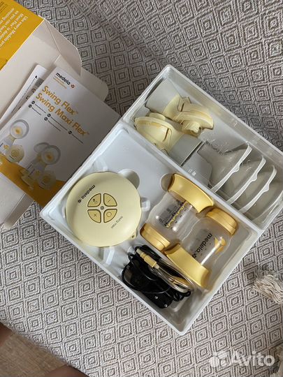 Молокоотсос medela swing maxi flex