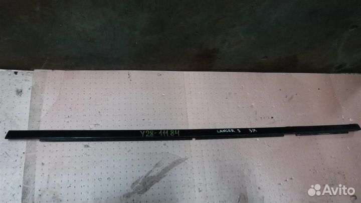 Накладка стекла заднего левого Mitsubishi Lancer