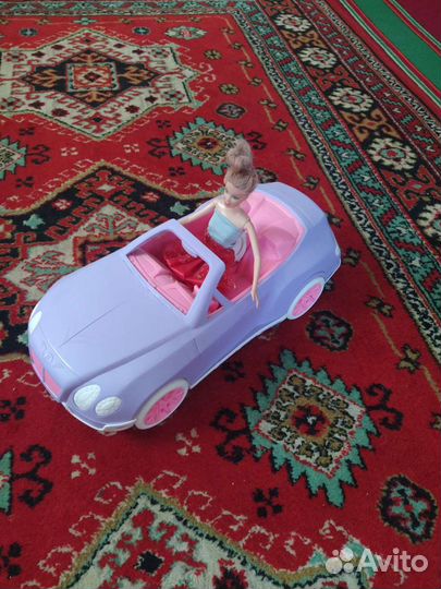 Детская игрушка машина -каталка