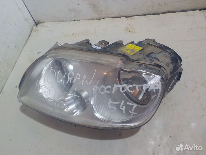 Фара левая Volkswagen touran