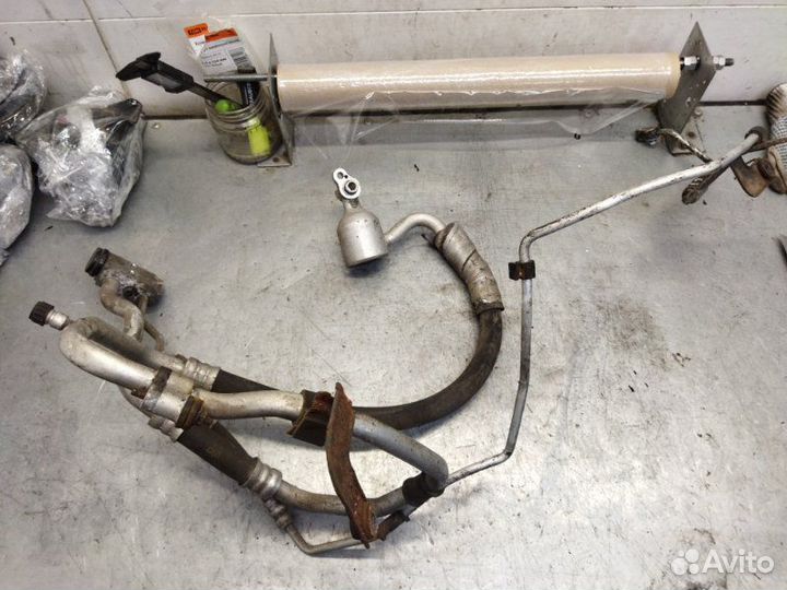 Трубка кондиционера Kia Rio II G4EE 1.4 2008