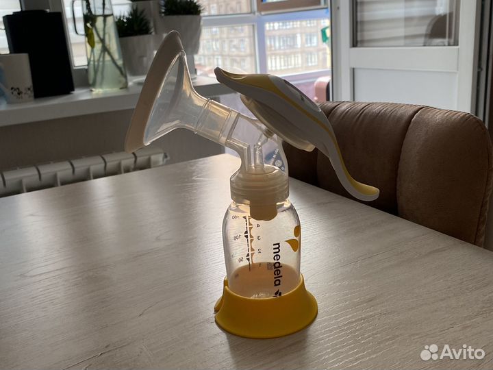 Молокоотсос medela